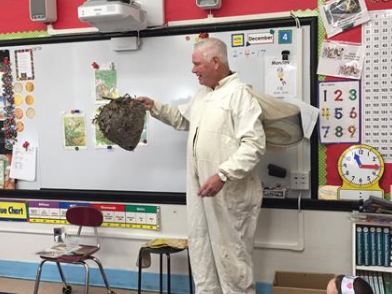 Mr. Michael, the beekeeper